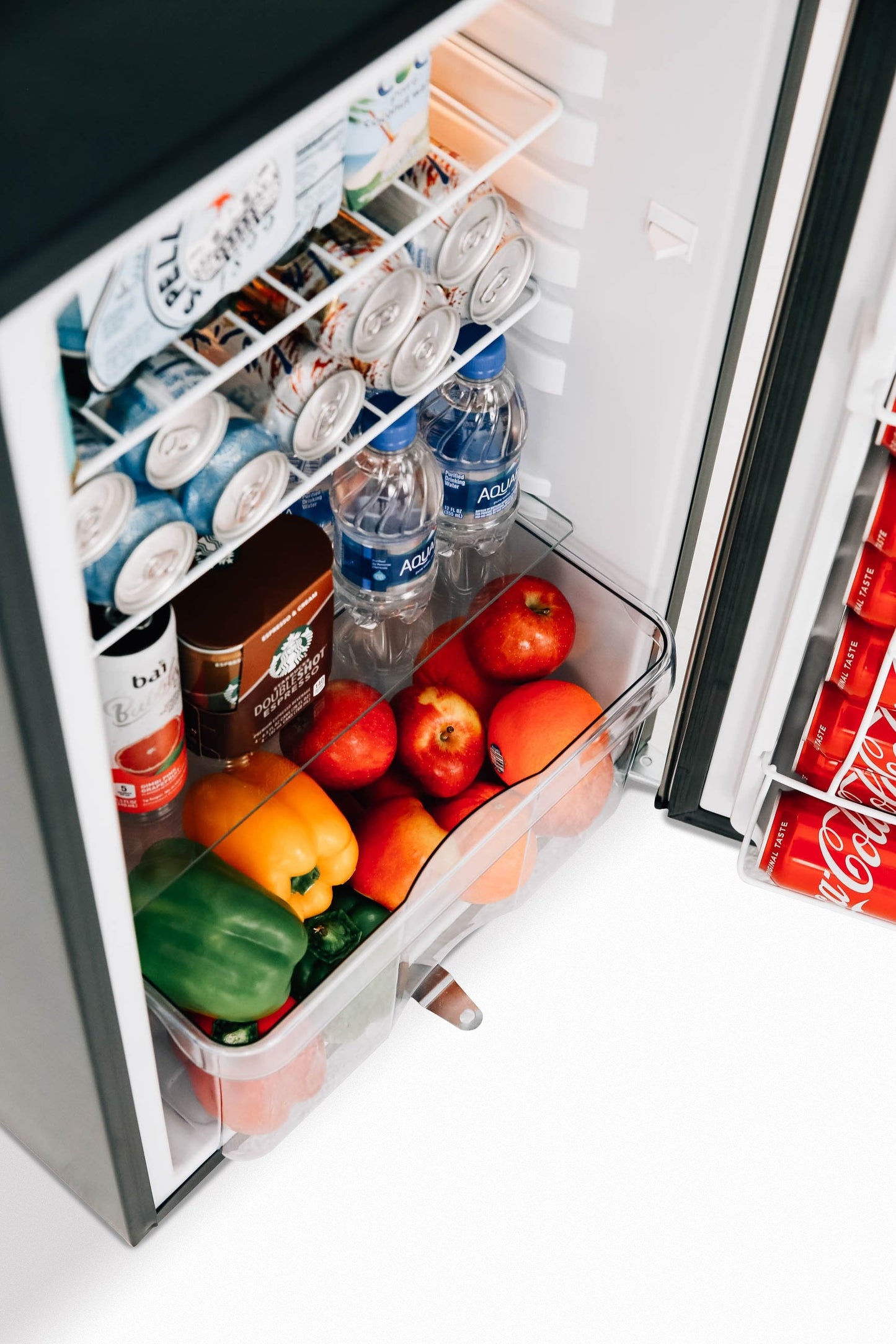 21" 4.2C Compact Refrigerator w/ Reversible Door